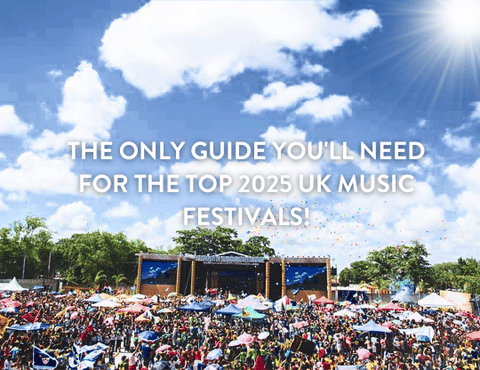 Festival field with main stage and blue skies
